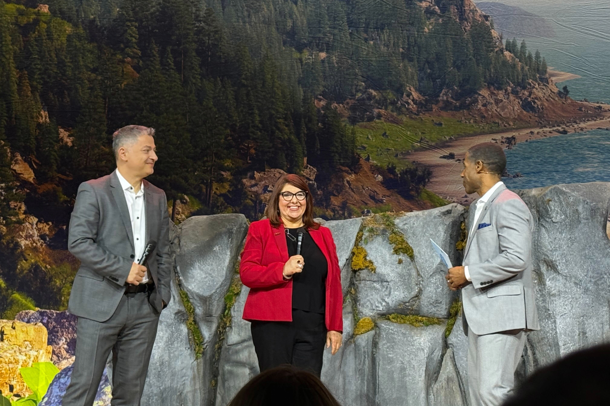 Kivanc Oner and Kate Korgan on stage at Salesforce Salesforce’s Education Summit.