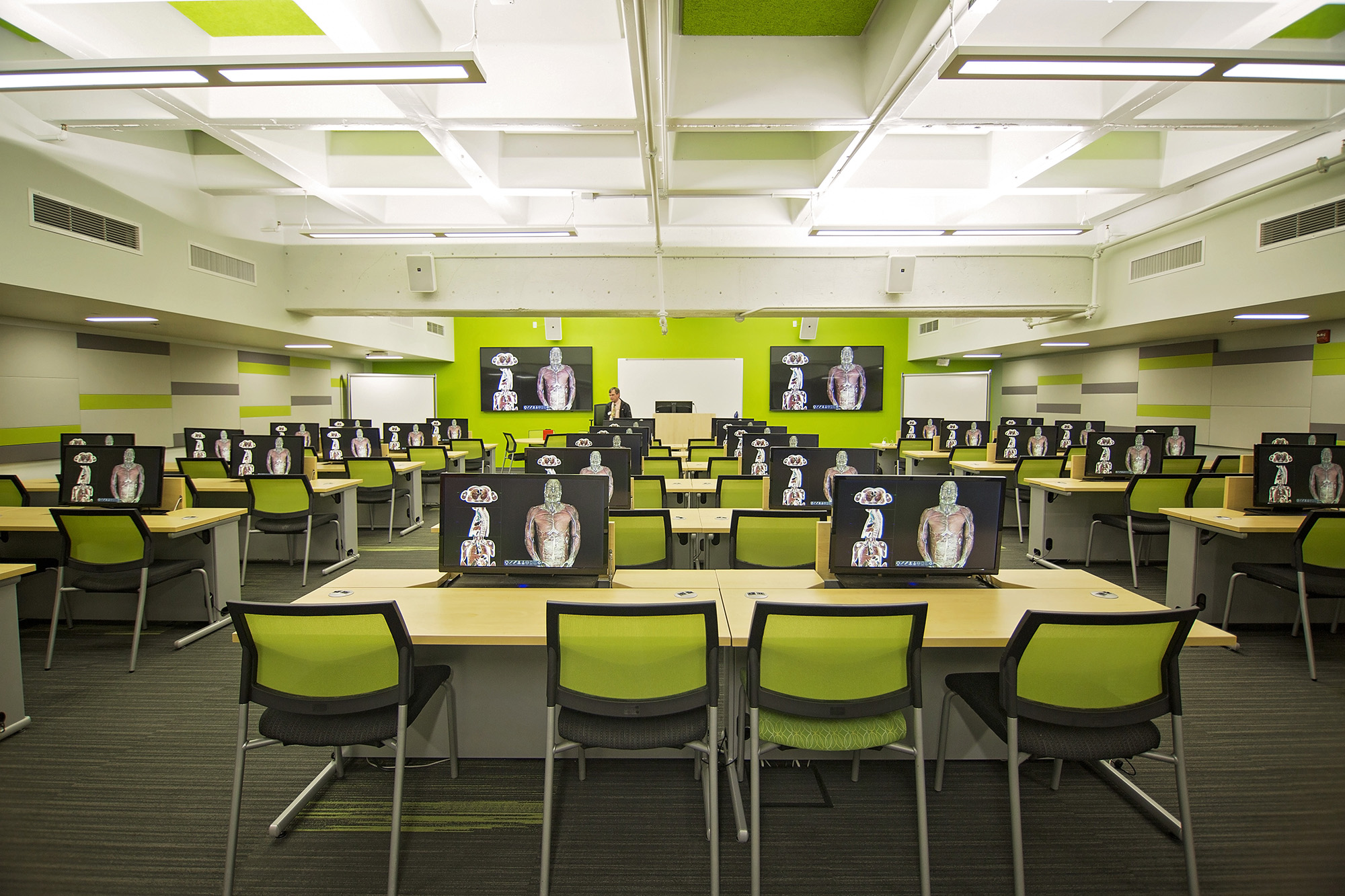 Row of computer monitors in a U-N-L-V computer lab.