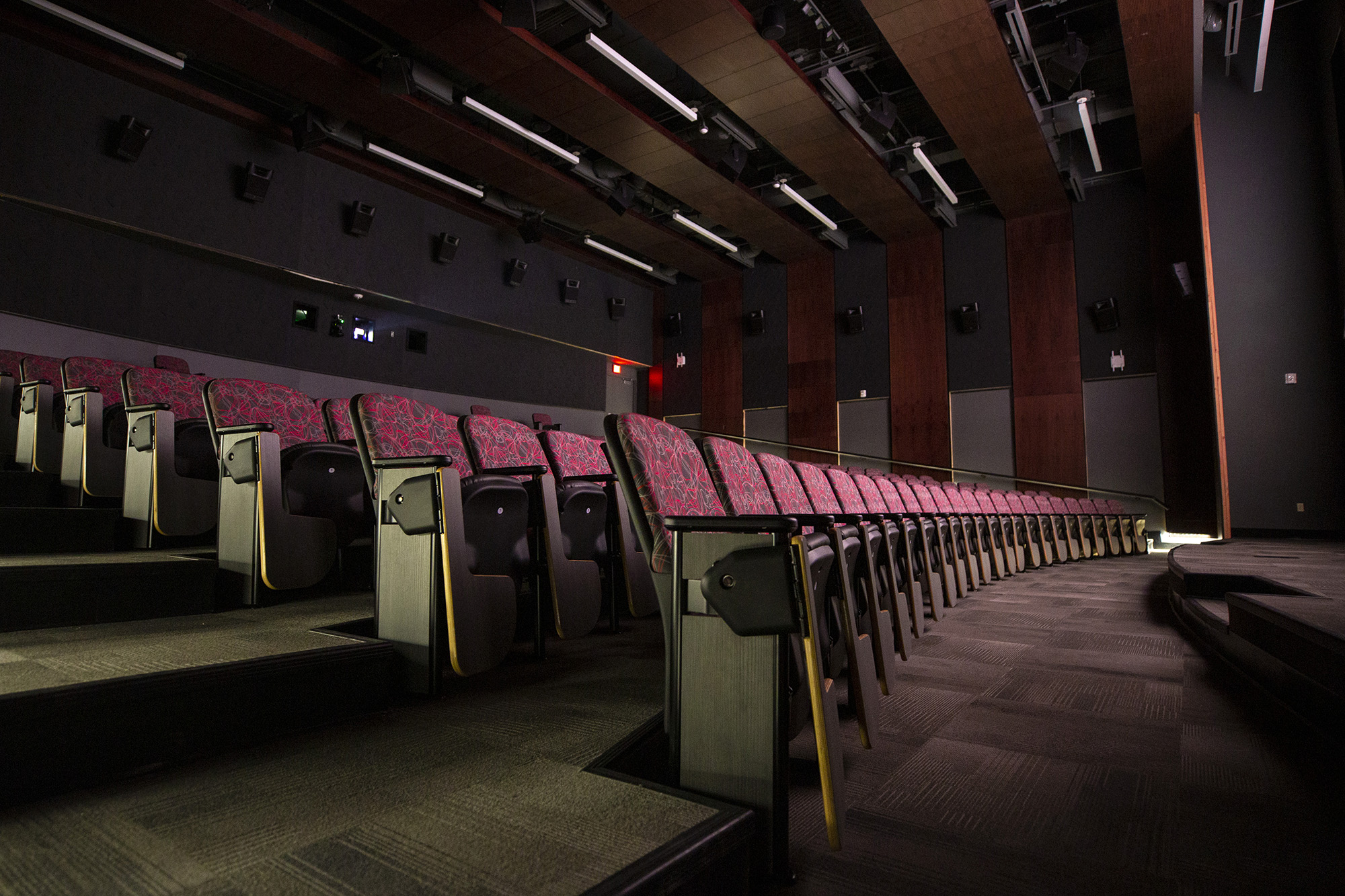 Wide diagonal view of a U-N-L-V amphitheater-style classroom.