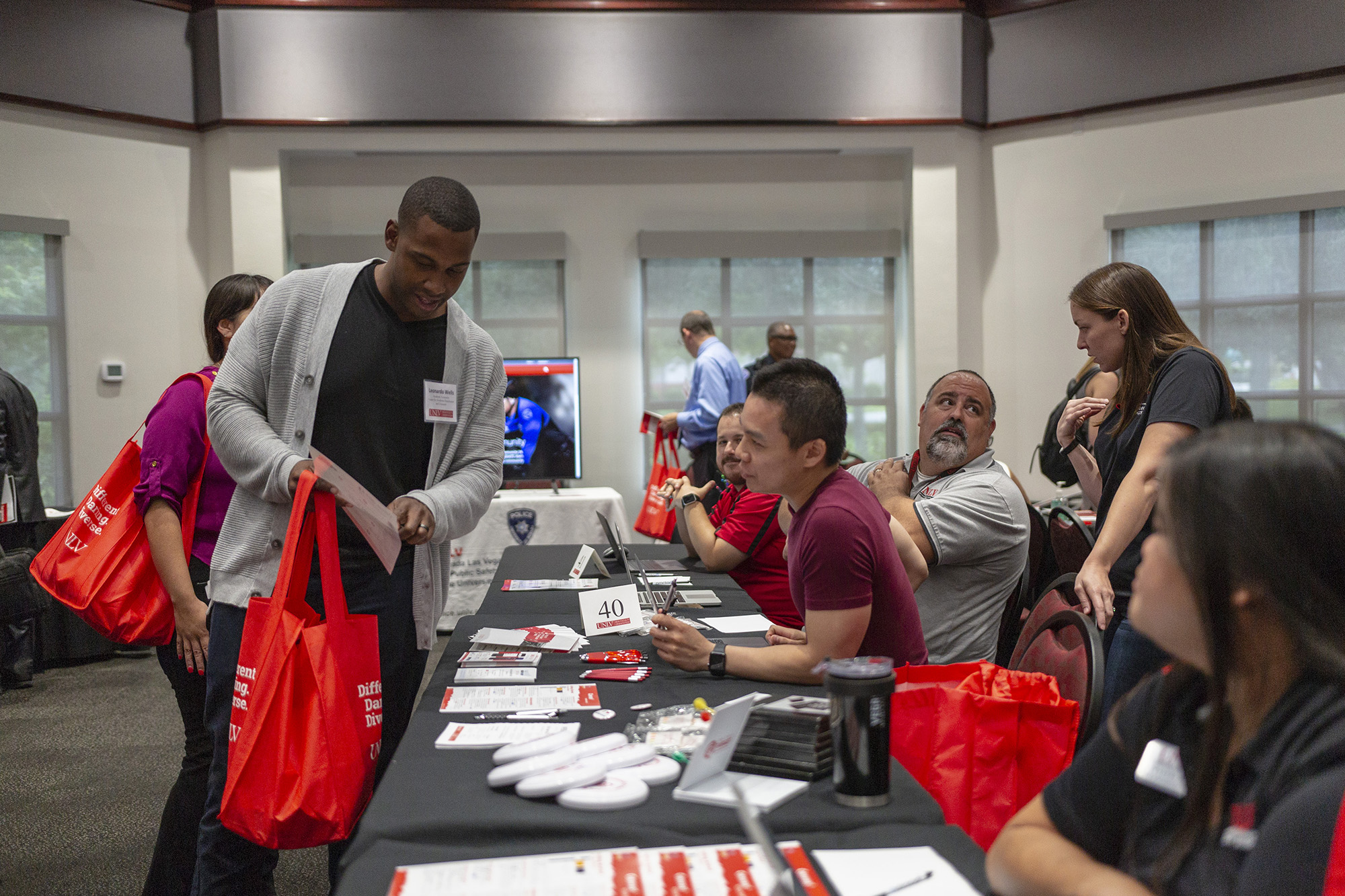 U-N-L-V staff assist new hires during new faculty/staff orientation.