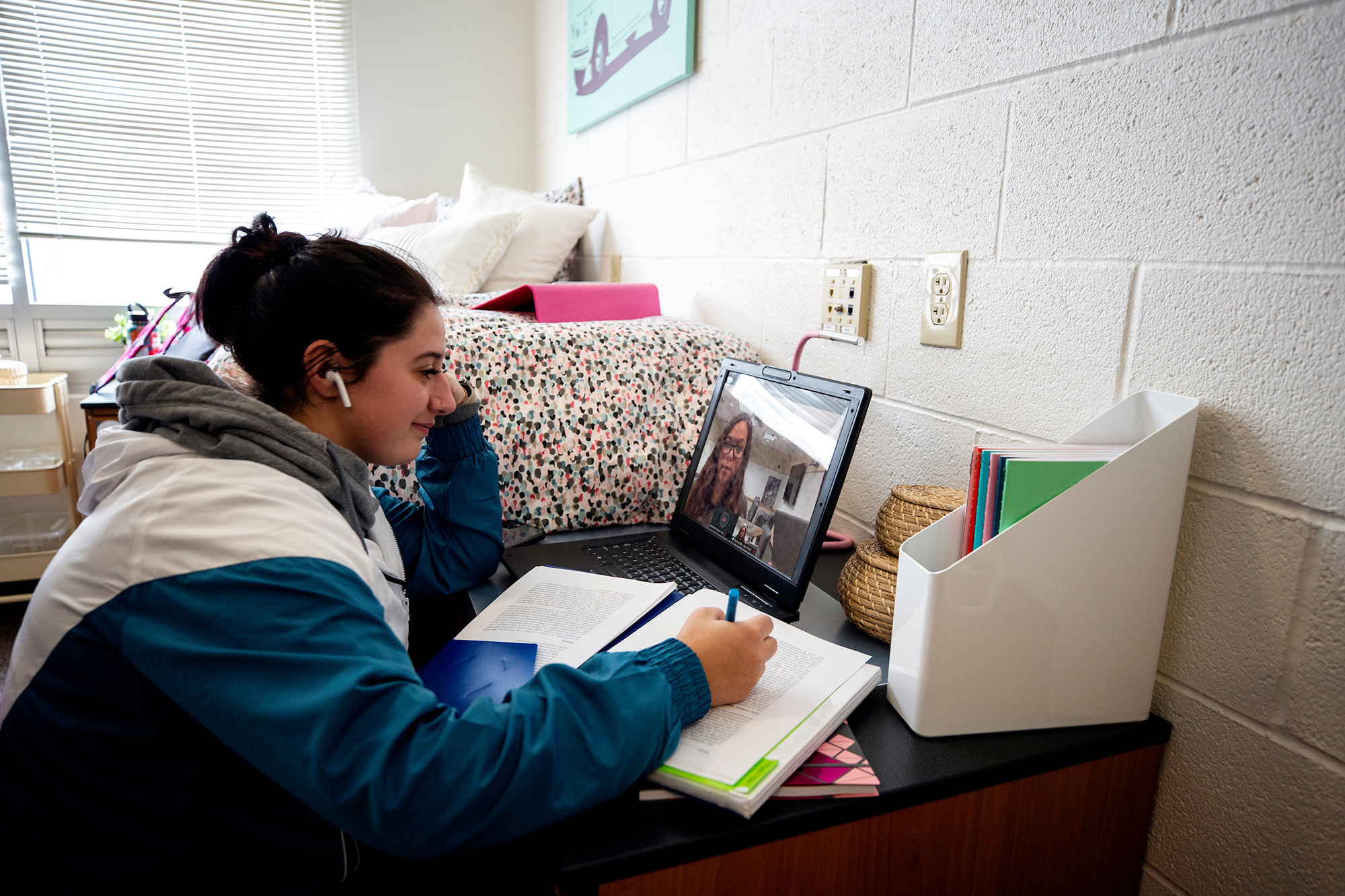 A student studies in a UNLV dorm room.