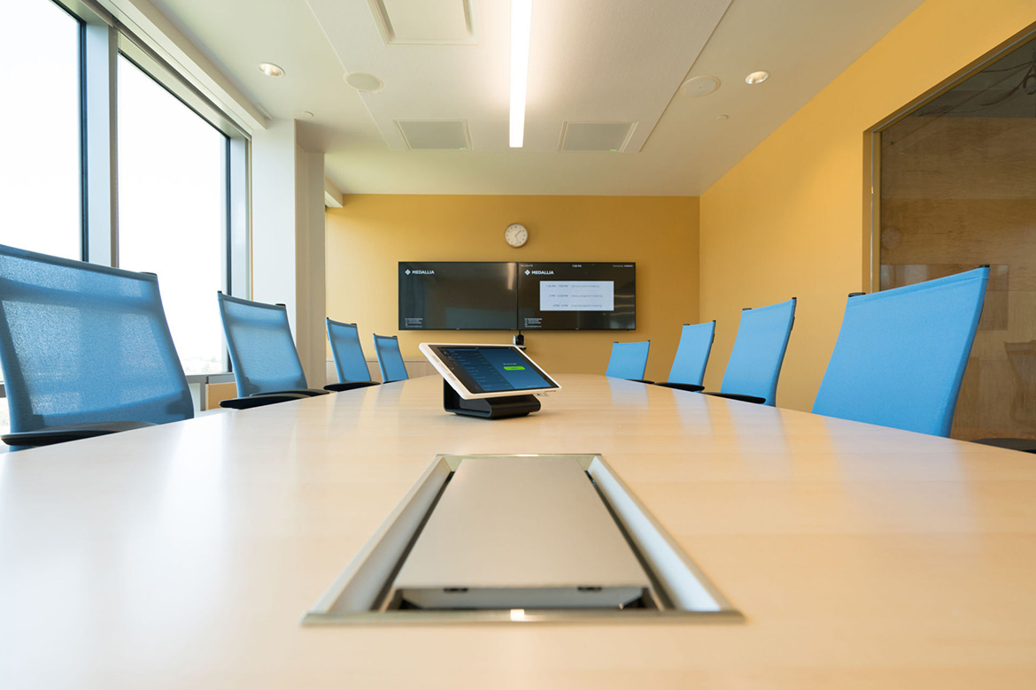 Long view down a conference room table.