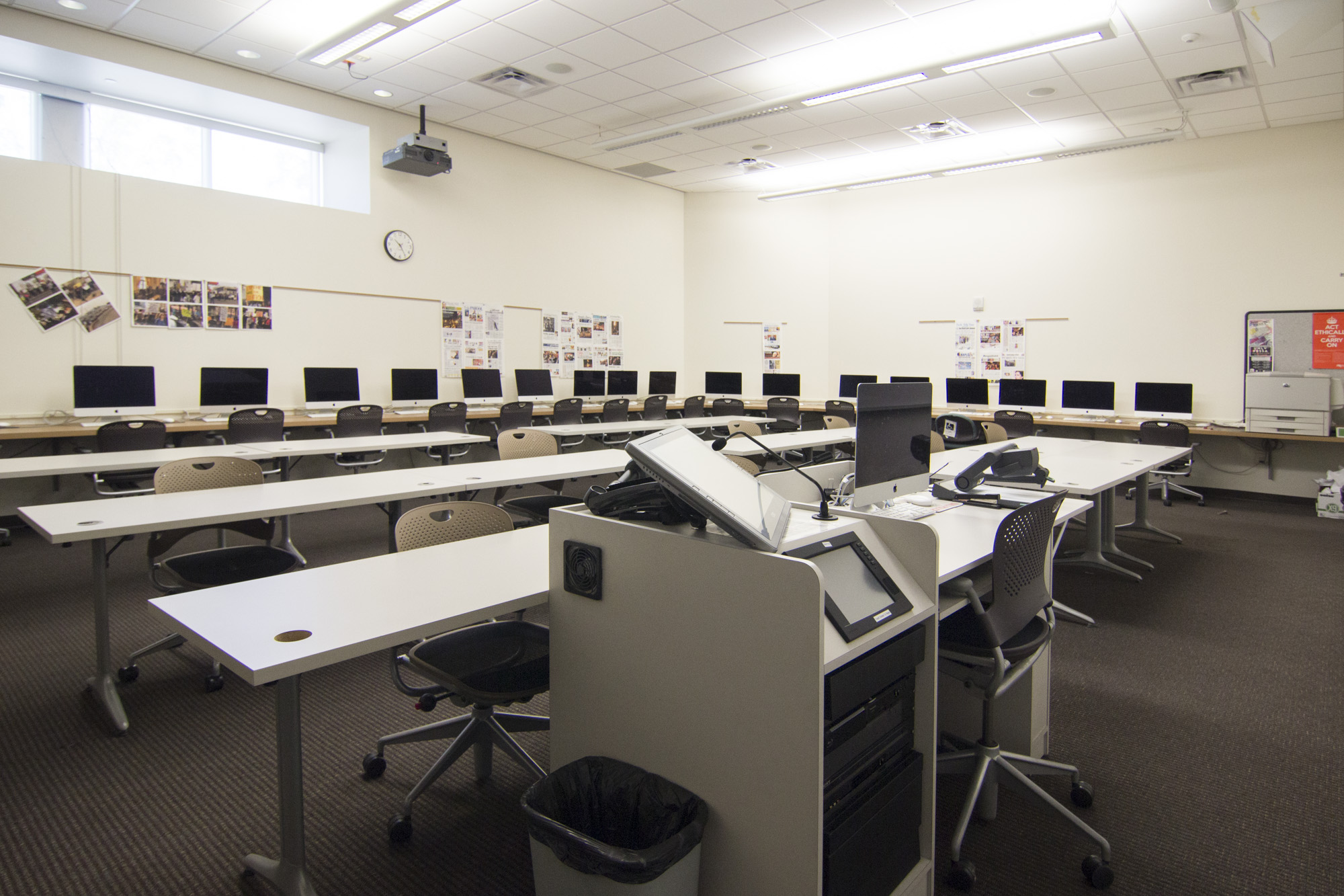 Wide view of an empty U-N-L-V computer lab.