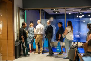 Tour attendees exploring UNLV's Dreamscape Learn Center.