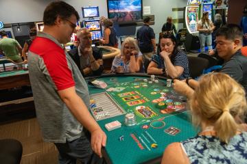 Tour attendees exploring the Stan Fulton International Gaming Institute.