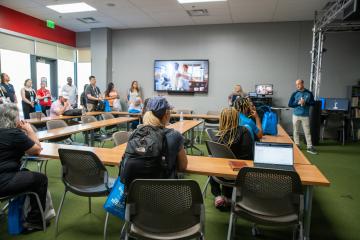 Tour attendees learning about UNLV's PGA Golf Management Program.