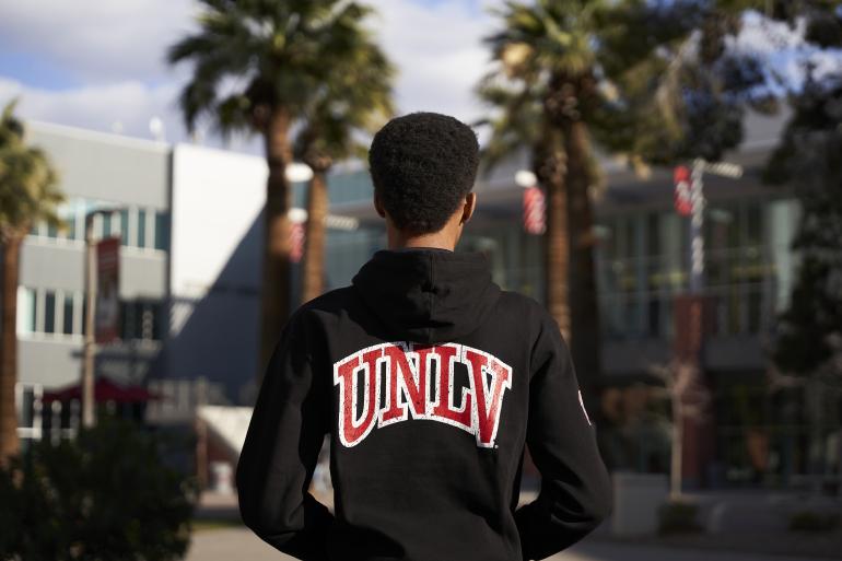 Person wearing sweatshirt with UNLV on the back