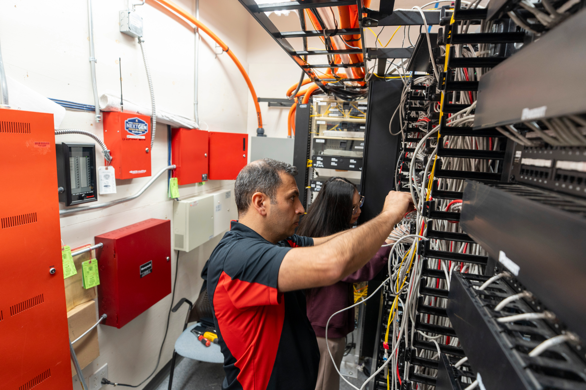 Network team installing new network infrastructure.