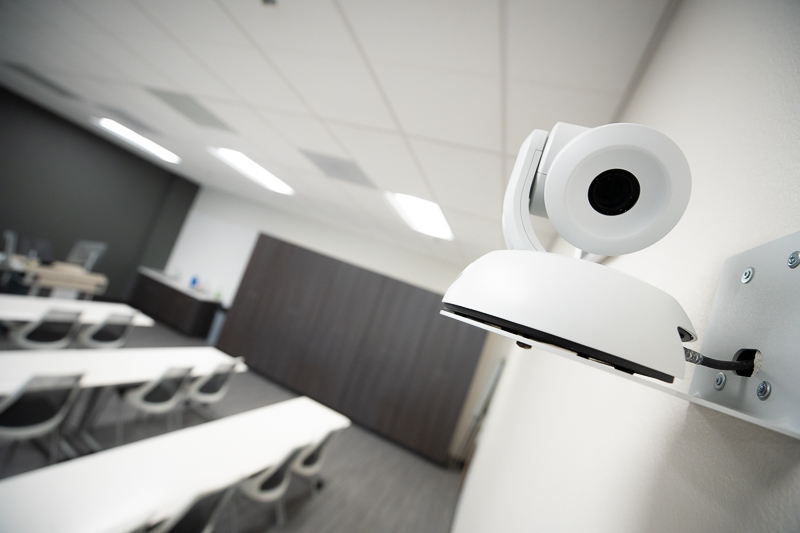 Ceiling camera with classroom in the background